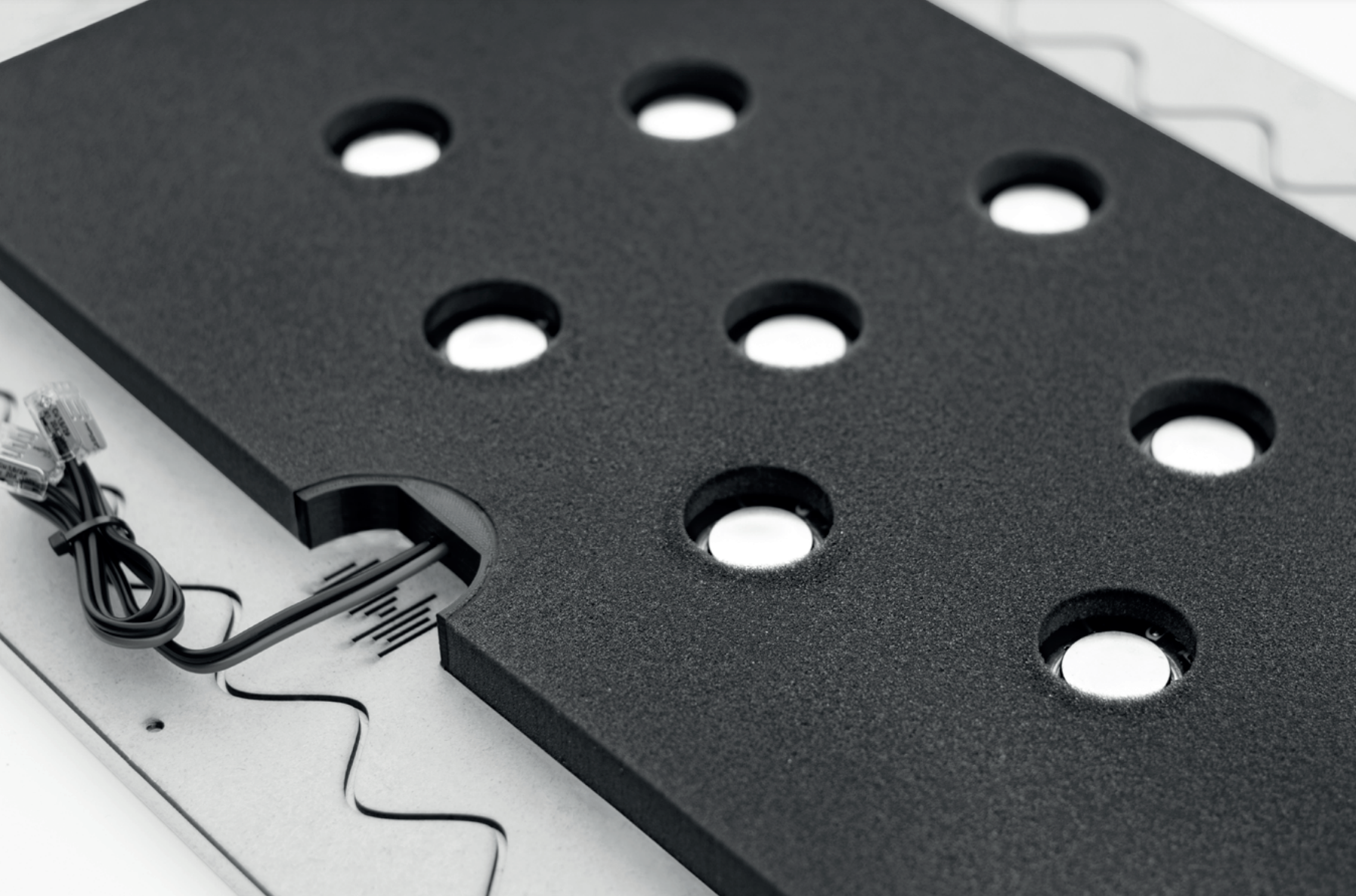 eight ultra-flat exciters inside the cerasonar 4062 architect